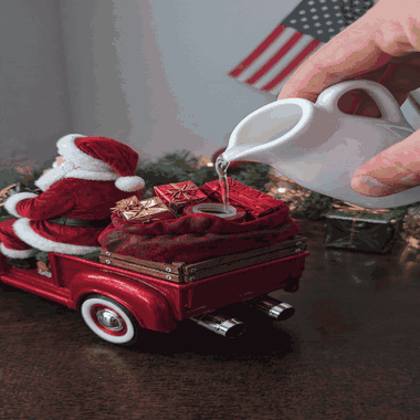 Filling the SantaMister humidifier with water through the gift sack